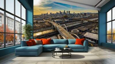 New 6th Street bridge in Los Angeles at sunset with the Los Angles skyline. Beautiful view of LA river with 6th street bridge against sunset. Aerial view of downtown Los Angeles city skyline  Wall mural