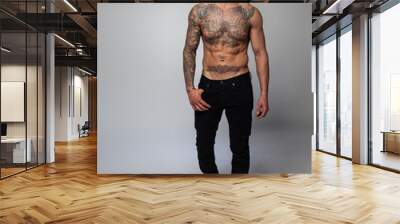 shirtless tattoed man Wall mural