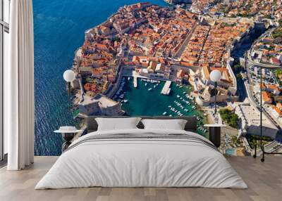 Aerial drone view of the Old historic city of Dubrovnik in Croatia, UNESCO World Heritage site. Famous tourist attraction in the Adriatic Sea.  Best destinations in the world. Wall mural