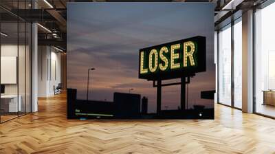 Loser concept, light ad sign, advertising in front of buildings in a small town evening with cloudy skies, faded background in photograph style illustration Wall mural