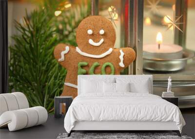 Gingerbread man cookie in eco jumper. Wall mural