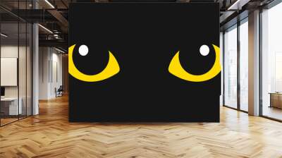 Yellow cat eyes in the dark. Wall mural