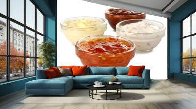 Assorted sauces in a bowl isolated on white background Wall mural