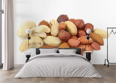 Pile of various nuts isolated on white background. Wall mural