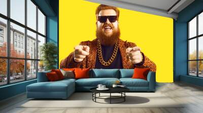 Happy guy in gold necklace and leopard suit pointing fingers at camera isolated on color background. Famous fashion designer, rich showbiz producer, casting director, funny celebrity says I choose you Wall mural