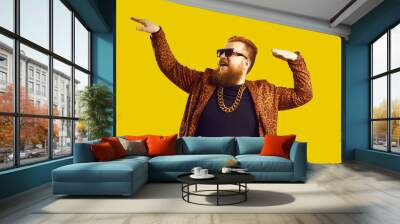 Rich bearded man in leopard print outfit and cool glasses vibing to music. Happy redhead showman, funny party guy, showbiz entertainer, glamour show presenter, night club goer dancing and having fun Wall mural