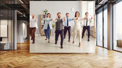 Yogi office people standing in yoga pose, employee group in formal wear doing exercise calming mind body. Active workers resting, wellness, health, meditate together for life balance, business success Wall mural