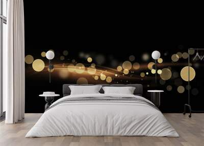 Abstract shiny color gold light wave design element with glitter bokeh effect on dark background. Wall mural