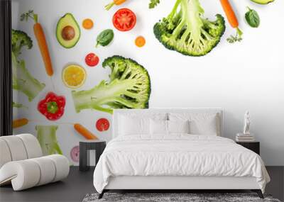 Creative layout made of avocado, tomato, broccoli, carrot, pepper, lemon and radish on the white background. Flat lay. Food concept.  Wall mural