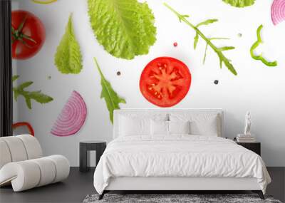 Creative layout made of summer vegetables. Food concept. Tomatoes, onion, pepper, salad leaves and lettuce on the white background. Wall mural