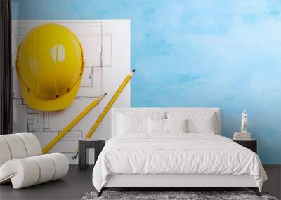 Blueprint floor plan architectural project on the table with yellow helmet and pencil Wall mural