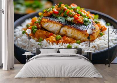 close up of rice paired with a traditional Indian fish curry The fish fillets are cooked in a tangy sauce Wall mural