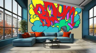 A teenage boy draws a graffiti image of the tag boom. street art Wall mural