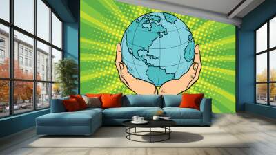 Blue planet Earth in human hands Wall mural