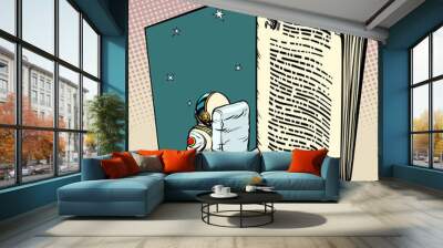 Book and astronaut, science fiction Wall mural