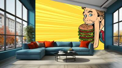 hungry man with a giant Burger, street food Wall mural