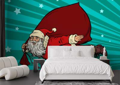 Santa Claus superhero is flying with a bag of gifts Wall mural