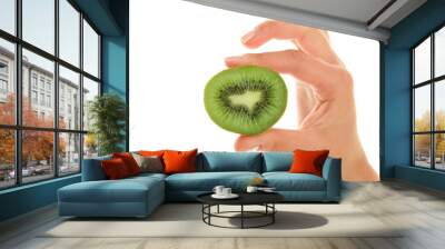 Woman's hand with kiwi Wall mural