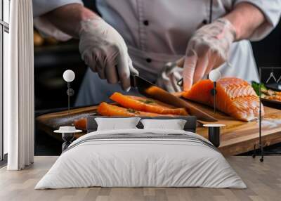 Chef slicing fresh salmon fillet on a wooden cutting board. The salmon is garnished with herbs and ready for cooking or sushi preparation. Wall mural