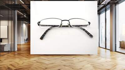 Close up modern style eyeglasses with transparent lenses isolated on white background with s Wall mural