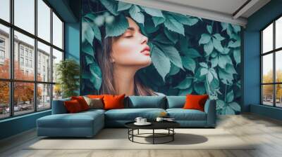 Beautiful fashion model girl enjoying nature, breathing fresh air in summer garden over Green leaves background. Harmony concept. Healthy beauty woman outdoor portrait Wall mural