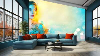 Beauty fantasy model spring girl in colorful bright neon lights. Portrait of beautiful summer young woman in UV. Art design colorful make up with golden butterflies. On colourful vivid background Wall mural