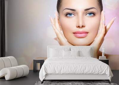 beauty portrait. beautiful spa woman touching her face Wall mural