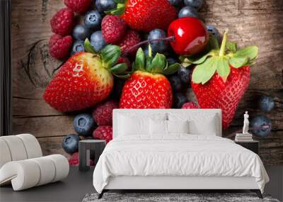 berries on wooden background. spring organic berry Wall mural