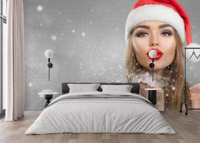 christmas winter fashion girl on holiday blurred winter background. beautiful new year and xmas holi Wall mural