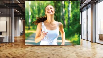 running woman. outdoor workout in a park Wall mural