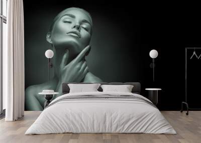 Sexy girl with holiday shiny professional makeup black and white portrait. Beaty woman touching her face closeup Wall mural