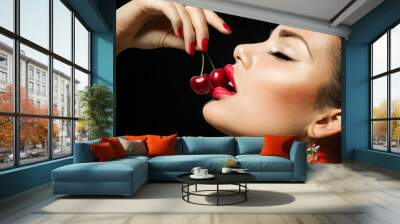 Sexy Woman Eating Cherry. Sensual red Lips with Cherries Wall mural