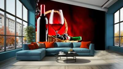 wine. bottle and glass of red wine with ripe grapes over black background Wall mural