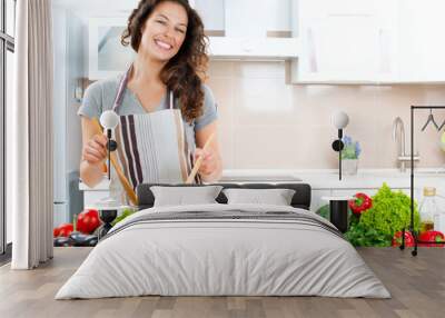 Young Woman Cooking. Healthy Food Wall mural