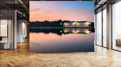 Admirable pink sunset sky over the architectural ensemble of the State reserve museum Kuskovo, former aristocratic summer country estate of the russian nobility of the 18th century. Moscow. Russia. Wall mural