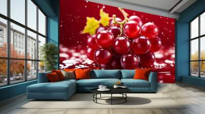  a cluster of red grapes in a pool of red liquid. Wall mural