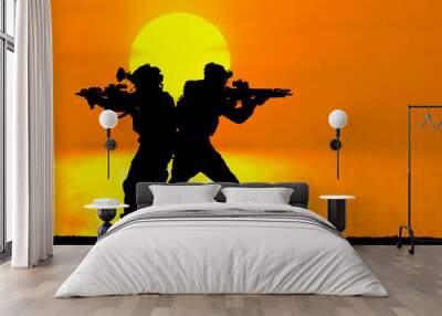 A black silhouette of an american soldier patrolling the sunset Wall mural