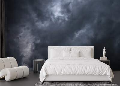 Scary epic sky with menacing clouds. Hurricane wind with a thunderstorm. Stock background, photo Wall mural