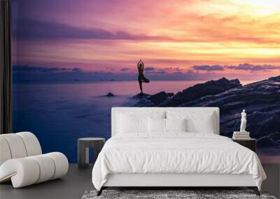 Silhouette woman yoga on the beach Wall mural