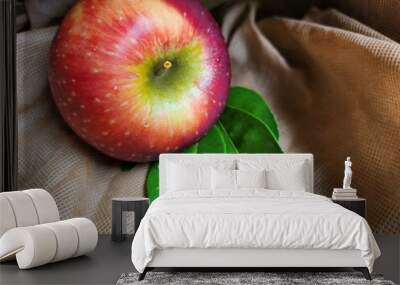 Ripe apple on brown background Wall mural