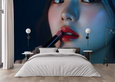 Asian woman applying lipstick Wall mural