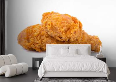 hot and crispy fried chicken legs isolated on a white background Wall mural