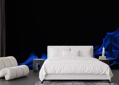 Beautiful fire blue flames on a black background. Wall mural