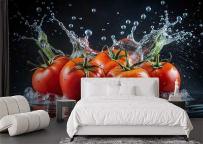 Dynamic splash of ripe red tomatoes in water isolated on dark backdrop Wall mural