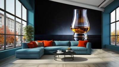 Elegant scotch whiskey glass on black background with reflections silhouette Wall mural