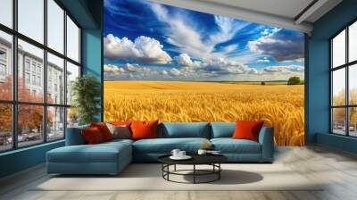 panoramic yellow agriculture field with ripe wheat and blue sky with clouds Wall mural