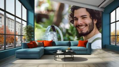 Wide banner image of handsome happy farmer in front of a greenhouse with pretty smile     Wall mural