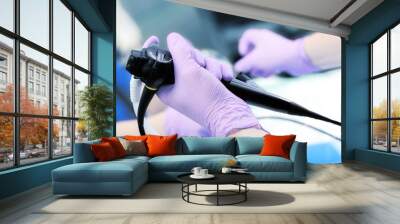 Instrument for endoscopy in the doctor's hands Wall mural