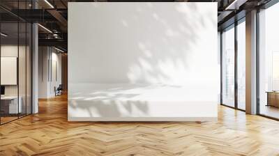 Minimal empty white wooden countertop counter in sunlight, leaf foliage shadow on white wall for luxury organic cosmetic, skincare, body care, beauty treatment product background 3D Wall mural