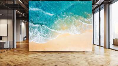 Top view of blue aqua sea water. Capture by drone. Capture sea wave and beach in summer by drone. Wall mural